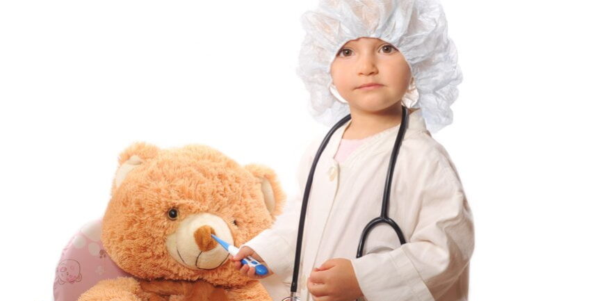 Beautiful girl playing doctor